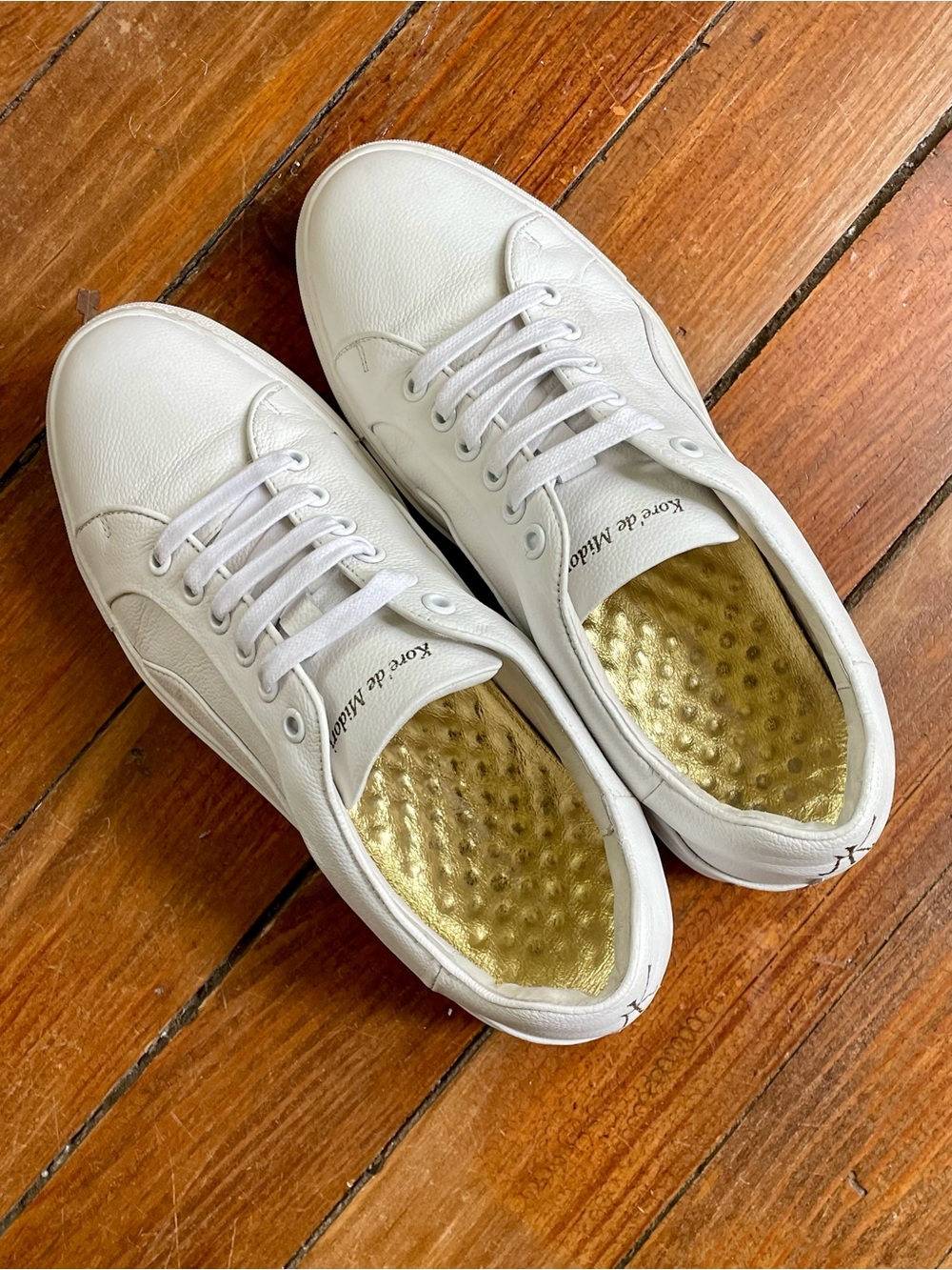 White genuine leather and Gold sneakers